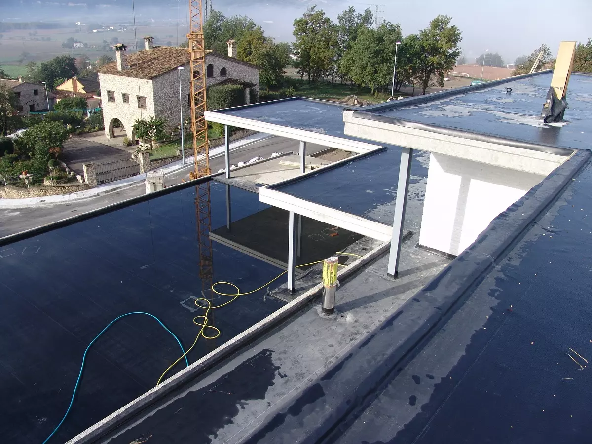 casa con tela butilica